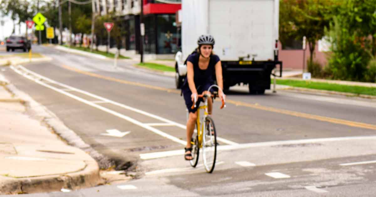 biking on downtown street